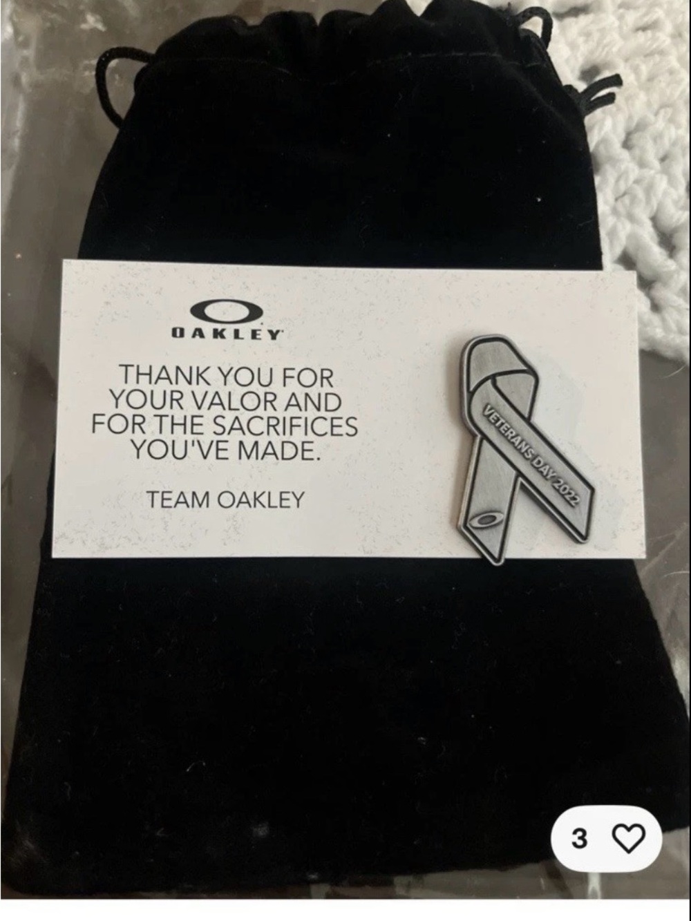 Oakley Silver and Black Ribbon Pin
